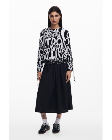 BLUSA DIONE ESTAMPADO LETRAS DESIGUAL