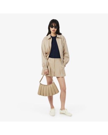 BERMUDAS CON PINZAS LACOSTE