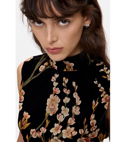 TOP ROMA DESIGUAL